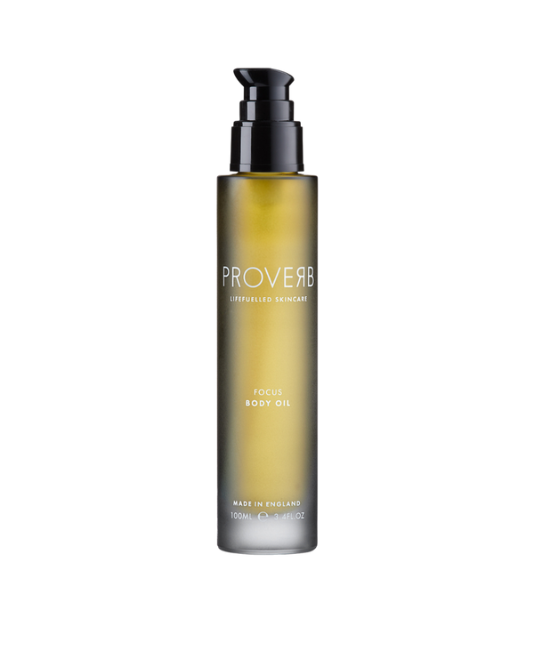 Elegant Proverb Focus Body Oil bottle, showcasing premium natural skincare oil