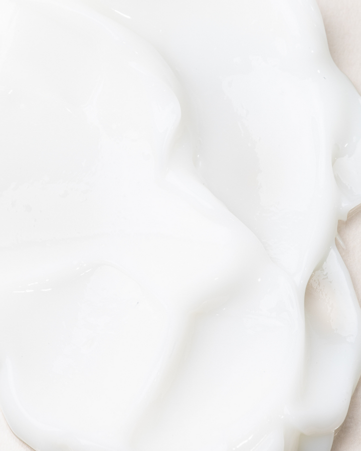 Texture detail of Awake Organics Coconut and Sesame Hair Conditioner, highlighting its rich and smooth consistency
